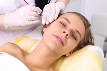 Obraz na płótnie Canvas Mesotherapy injections in the face.
