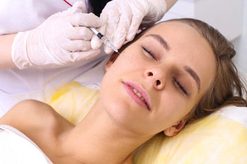 Fototapeta na wymiar Mesotherapy injections in the face.