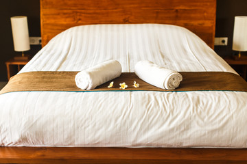 room in villa, towel on the bed