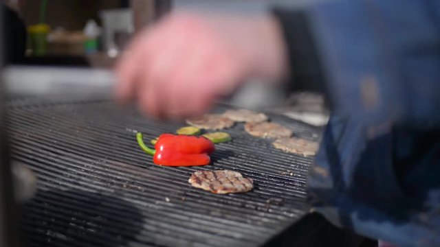 People cook barbecue grill, grilled steak, Frying fresh meat, Chicken BBQ, sausage, kebabs, hamburger, picnic with mushrooms and meat