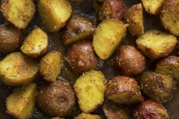 Oven baked potatoes close up