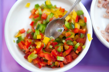 slices of green, yellow and red bell pepper