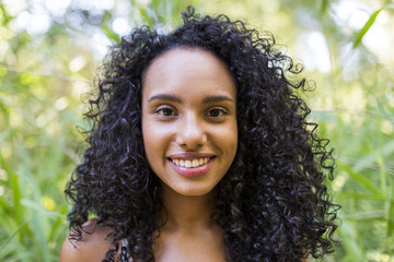 portrait of a young afro american woman smiling