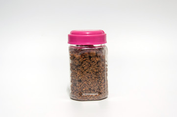 Chili con carne in bottle on white background,selective focus.