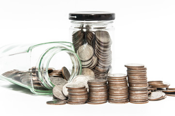 Saving money coin in bottle concept on white background,selective focus.