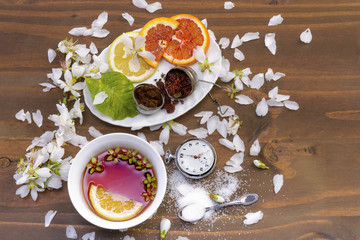 Pocket watch and teacup / Pocket watch with service from tea and biscuits.