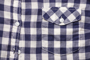 Fototapeta na wymiar Textile texture, checkered shirt with pocket useful as background