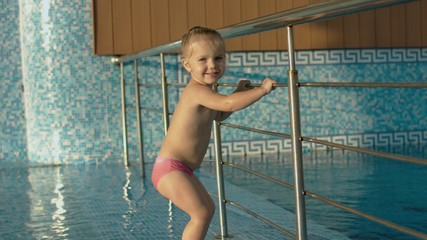 Little girl having fun in the pool