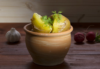 Potatoes boiled in their skins in a clay pot