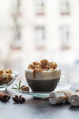 Glass of coffee with popcorn