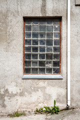 Concrete wall with glass block window