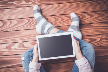 Young woman using digital tablet