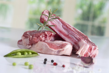 Raw lamb chops with fresh herhbs redy forcooking
