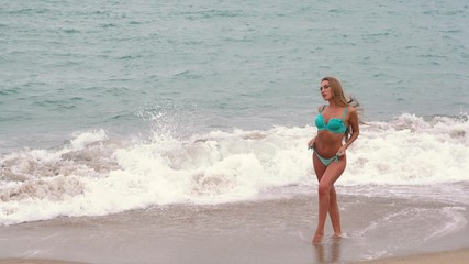 Sexy bikini model posing on the beach. vietnam.