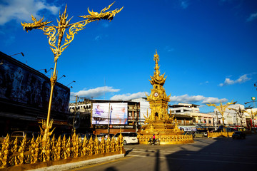 Fototapeta na wymiar golden clock tower, Chiang Rai