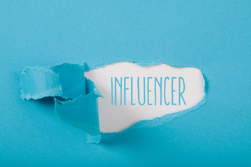 Influencer message on paper torn ripped opening