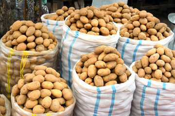 Sacks of potatoes for sale in the market