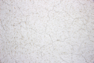 Painted wall covered with cracks