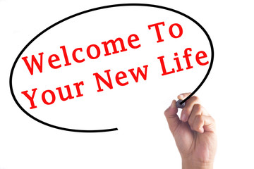 Hand writing Welcome To Your New Life on transparent board