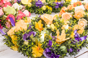 Background for easter, card with eggs and flowers on white table, home decor