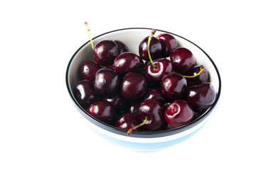 Close up fresh cherries in bowl