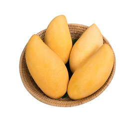 Golden mango in a rattan basket