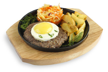 Сteak with egg and vegetables