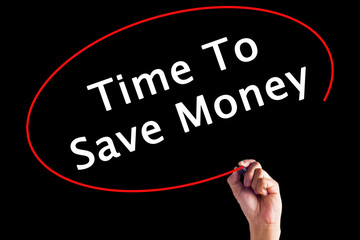 Hand Writing Time To Save Money with a marker over transparent board.