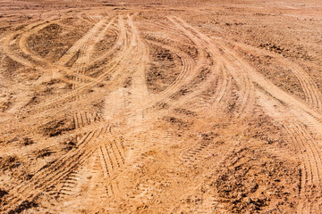 Tired track on the ground.