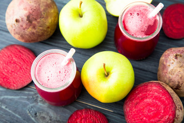 Healthy fresh detox beetroot and apple juice in glass