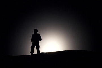 Silhouette Of A Soldier on a dark background