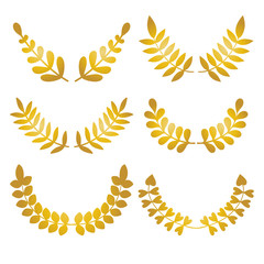 Vector set of golden design floral laurels isolated on white background.