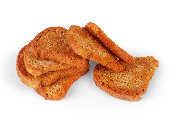 Pile of rye croutons isolated on white