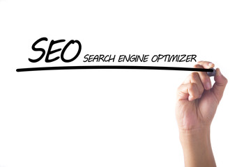 Hand writing SEO word on transparent board