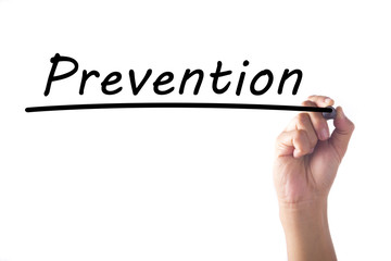 Hand writing Prevention word on transparent board