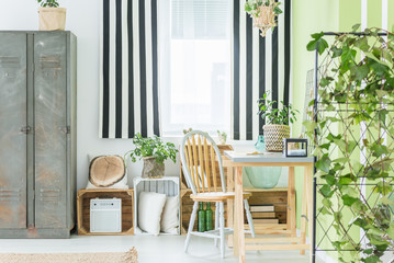 Room with striped window curtain