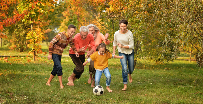 family playing football 