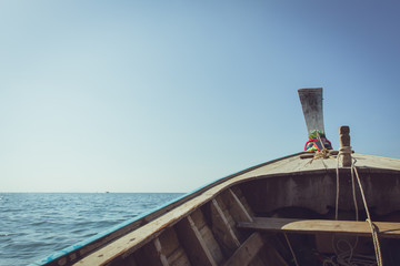 Obraz premium Thailand summer travel sea, Thai boat at sea beach Krabi Phi Phi Island vintage color tone.
