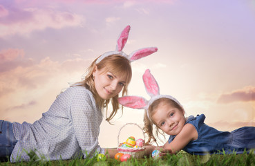 Mother and daughter with easter eggs