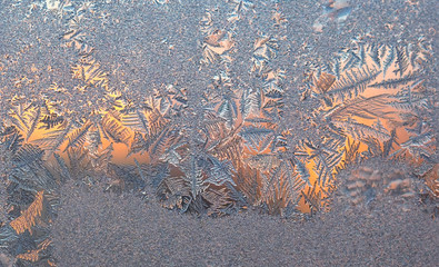 frost. wonderful winter patterns at sunset.
