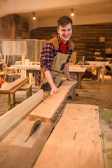 Carpenter is studying,works with the tools without protection