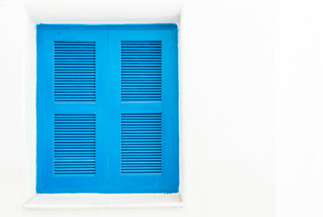 blue window with white wall