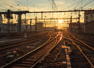 Fototapeta na wymiar Sunrise over the railroad tracks at Perrache station in Lyon, France.