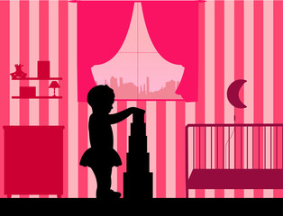 Girl plays with cubes in the room, one in the series of similar images silhouette