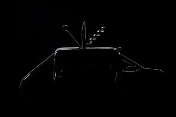 penknife silhouette on black surface