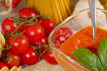 Pasta with tomato sauce and cherry tomatoes