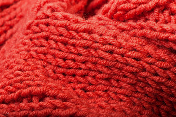 Background of red knitted fabric.
