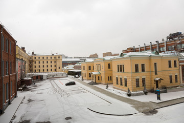 MOSCOW, RUSSIA - FEBRUARY 12, 2017: Renovated old manor house in the Red Rose city's block on a snowy day