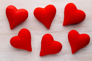 Red hearts the gray background. Valentine Day background.