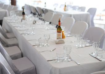 Serving table prepared for event party or wedding. Bright interior.